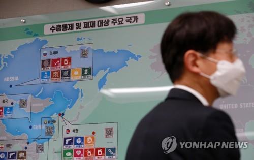 This photo, taken on Feb. 24, 2022, shows a map indicating countries under international sanctions. (Yonhap)
