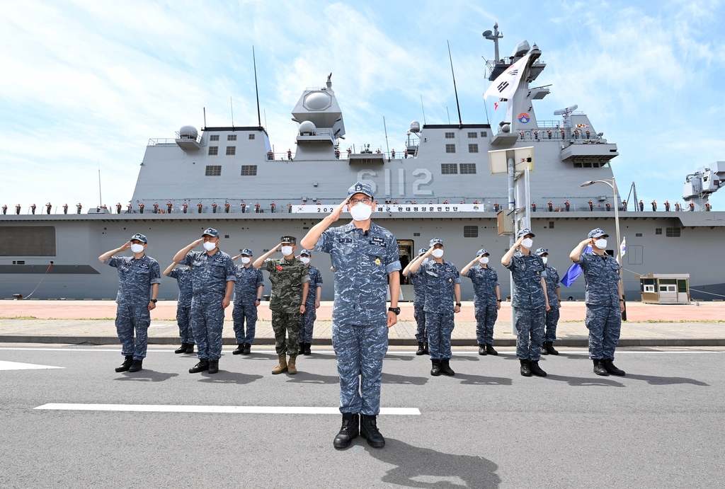 Members of a South Korean fleet salute during a ceremony at a naval base on the southern island of Jeju on May 31, 2022, before they depart for Hawaii to join the Rim of the Pacific Exercise, in this photo provided by the Navy. (PHOTO NOT FOR SALE) (Yonhap)