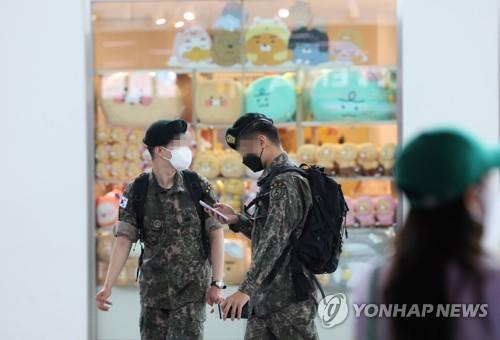 This file photo taken June 17, 2022, shows service members at Seoul Station in central Seoul. (Yonhap)