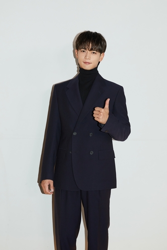 Minho of K-pop boy group SHINee poses for the camera during an online press conference to promote his first solo album, "Chase," on Dec. 6, 2022, in this photo provided by SM Entertainment. (PHOTO NOT FOR SALE) (Yonhap)