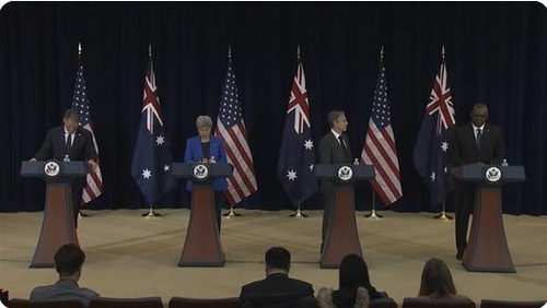 The top diplomats and defense officials of the United States and Australia hold a joint press conference at the U.S. Department of State in Washington after the annual U.S.-Australia Ministerial Consultations at the state department in Washington on Dec. 6, 2022, in this image captured from the YouTube channel of the state department. They are (from R) U.S. Secretary of Defense Lloyd Austin, U.S. Secretary of State Antony Blinken, Australian Minister for Foreign Affairs Penny Wong and Australian Deputy Prime Minister and Minister for Defense Richard Marles. (Yonhap)