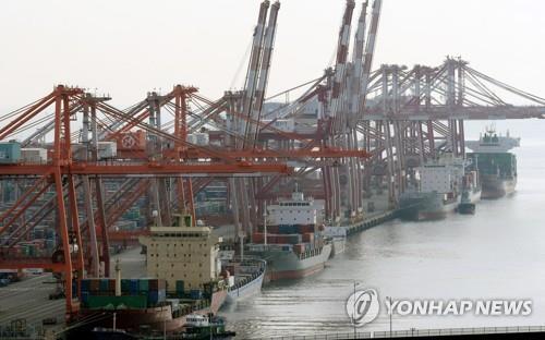 This file photo taken Dec. 9, 2022, shows shipping containers at a pier in South Korea's largest port of Busan. (Yonhap)