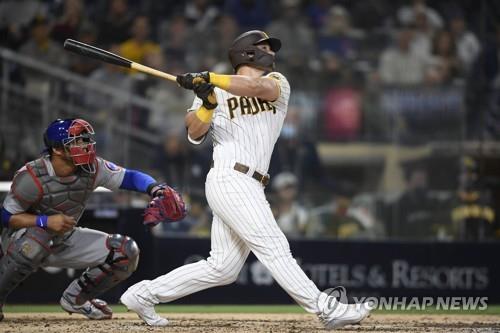 In this Getty Images file photo from June 7, 2021, Brian O'Grady of the San Diego Padres hits a two-run home run against the Chicago Cubs during the bottom of the third inning of a Major League Baseball regular season game at Petco Park in San Diego. (Yonhap)