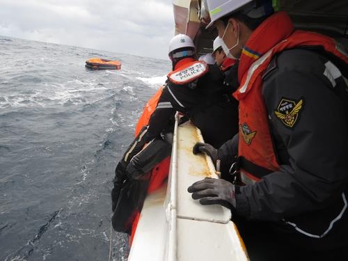This image provided by the Korea Coast Guard shows a search operation under way after a cargo ship sank off the southern island of Jeju on Jan. 25, 2023. (PHOTO NOT FOR SALE) (Yonhap)