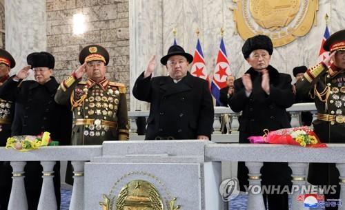  N. Korean leader attends military parade; ICBMs on display