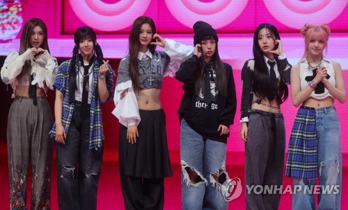 K-pop girl group Nmixx poses for the camera during a media showcase at a Seoul music hall on March 20, 2023, for its first EP, "Expergo." (Yonhap)