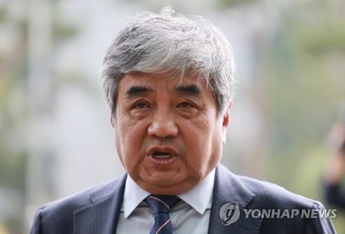 Broadcasting watchdog chief to attend court hearing on arrest warrant