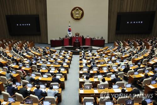 A motion requesting parliamentary consent for the arrest of two lawmakers involved in a cash-for-votes scandal is being reported to the National Assembly, in this file photo taken May 30, 2023. (Yonhap)