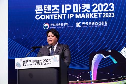 Sanrio President and CEO Tomokuni Tsuji speaks at the opening ceremony of the Content IP Market 2023 at COEX in Seoul, in this photo provided by the Korea Creative Content Agency on Nov. 28, 2023. (PHOTO NOT FOR SALE) (Yonhap) 