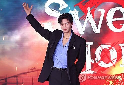 Song Kang poses for pictures at a media event for "Sweet Home 2" in Seoul on Nov. 30, 2023. (Yonhap)