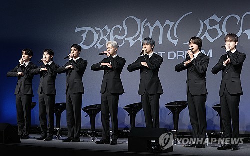 K-pop boy group NCT Dream poses for photographers during a news conference for its fifth EP, "Dream()scape," in Seoul on March 25, 2024. (Yonhap) 