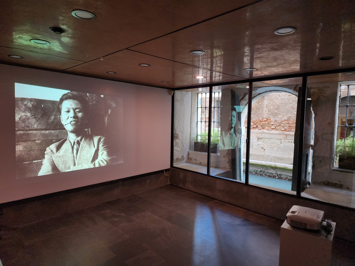 Yoo Young-kuk's photo is shown on the wall of the Fondazione Querini Stampalia in Venice on April 17, 2024. (Yonhap)