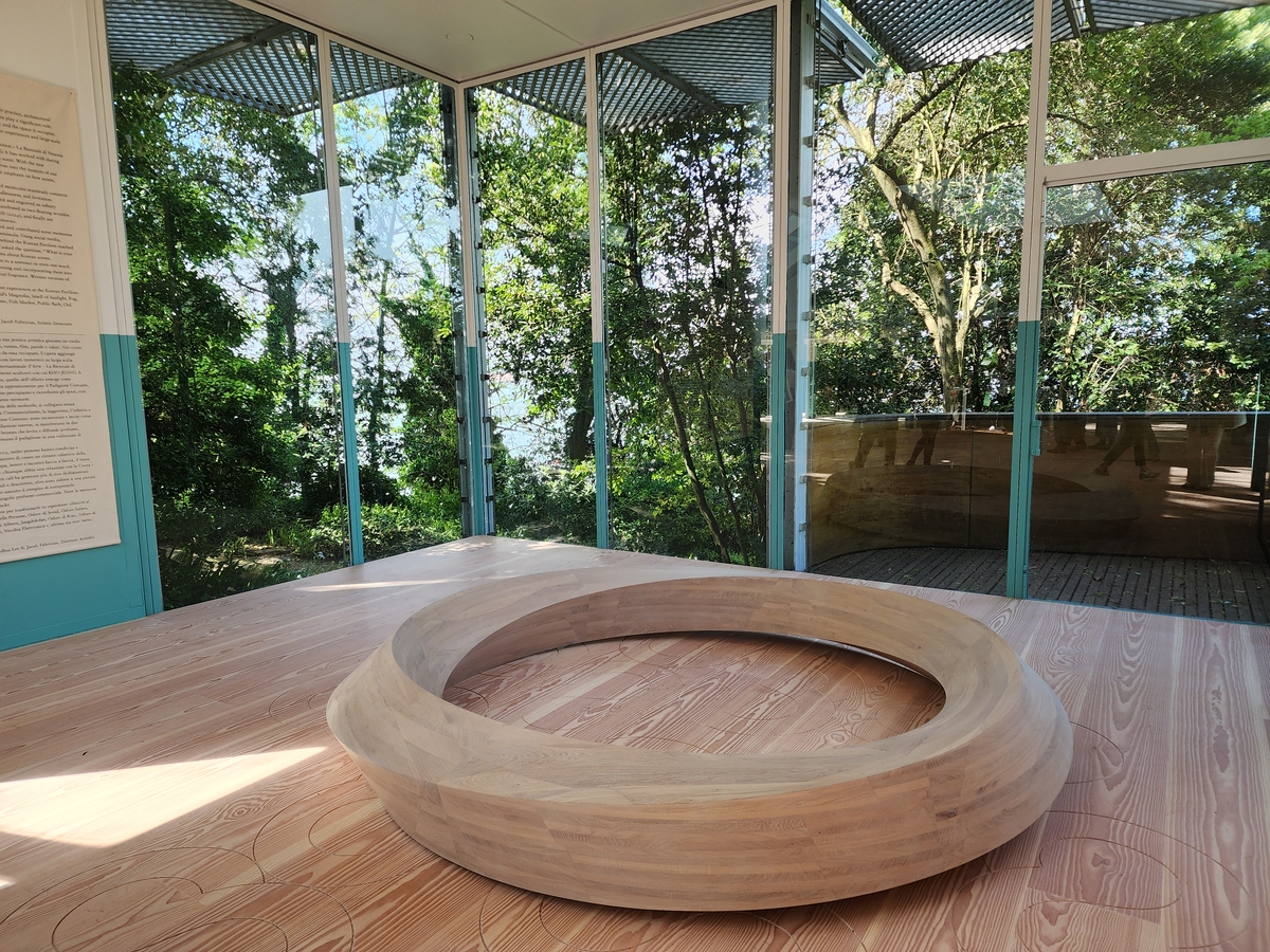 A Mobius strip-shaped wooden sculpture is displayed in the Korean Pavilion of the 60th Venice Biennale on April 17, 2024. (Yonhap)