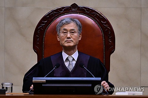 Supreme Court Chief Justice Cho Hee-dae attends the trial for Democratic Party presidential candidate Lee Jae-myung's election law violation case at the court in southern Seoul on May 1, 2025. (Pool photo) (Yonhap)