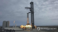 스페이스X, 달 우주선 띄울 최강 로켓 점화…31개 엔진서 불꽃