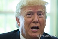 (AMPLIACIÓN) Trump no planea reunirse con Kim en Corea del Sur