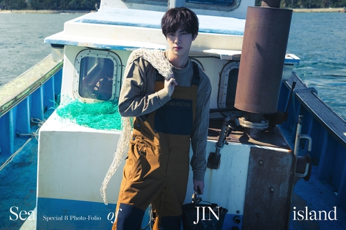 Jin de BTS lanzará un álbum de fotos antes de su servicio militar