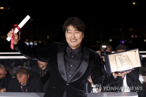 In this AP photo, South Korean actor Song Kang-ho poses after winning Best Actor for the film "Broker" at the 75th Cannes Film Festival in Cannes, France, on May 28, 2022. (Yonhap)