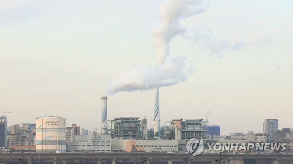 This file photo provided by Yonhap News TV shows emissions from a factory in South Korea. (PHOTO NOT FOR SALE) (Yonhap)