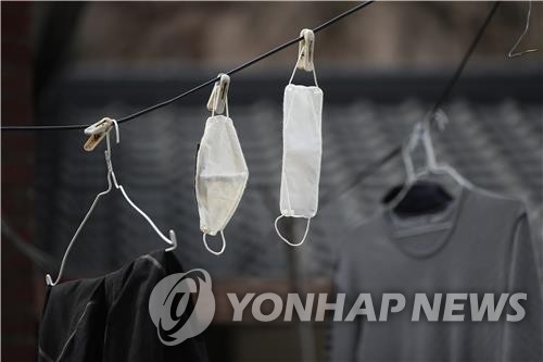 S. Korea to recall defective cotton masks from market on safety issues - 1