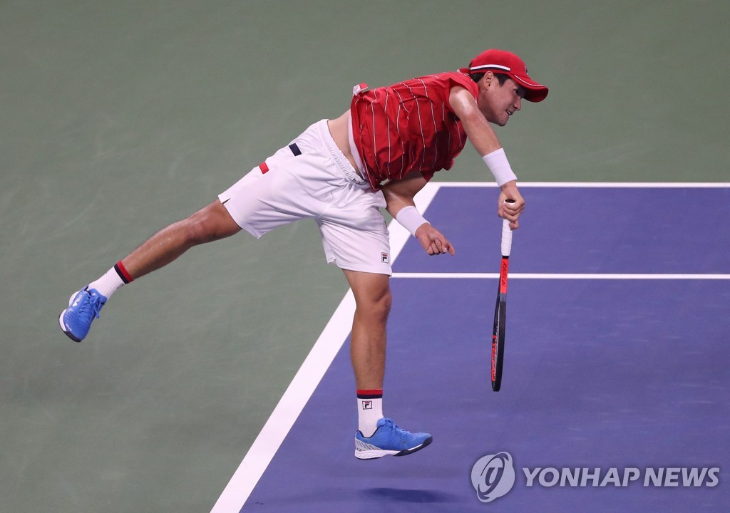 In this Getty Images photo, Kwon Soon-woo of South Korea serves against Denis Shapovalov of Canada during the second round of the men's singles at the U.S. Open at Billie Jean King National Tennis Center in New York City on Sept. 2, 2020. (Yonhap)