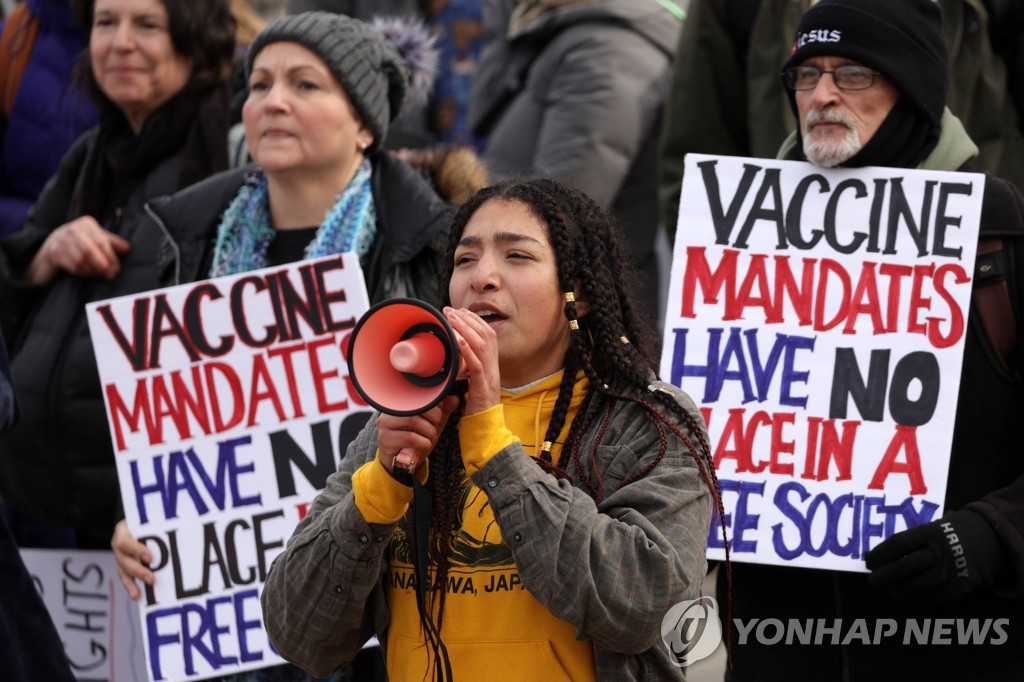 US-PROTESTORS-MARCH-AGAINST-VACCINATION-MANDATES-IN-WASHINGTON,-