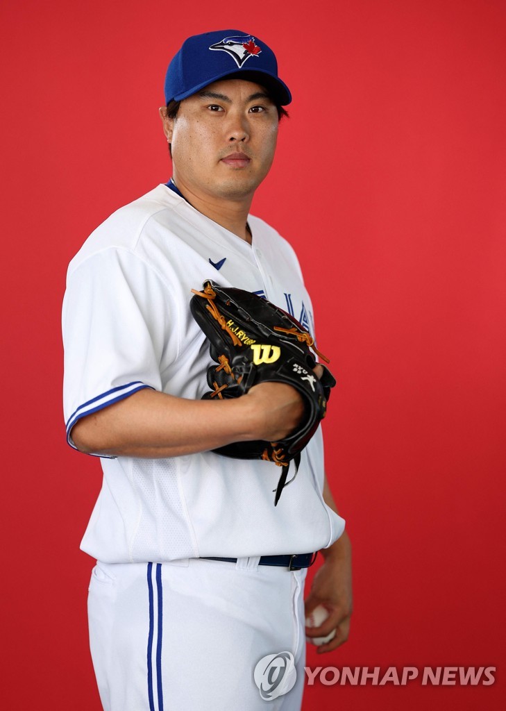 In this Getty Images file photo from Feb. 22, 2023, Toronto Blue Jays pitcher Ryu Hyun-jin poses for a portrait during the team photo day at the Blue Jays spring training facility in Dunedin, Florida. (Yonhap)