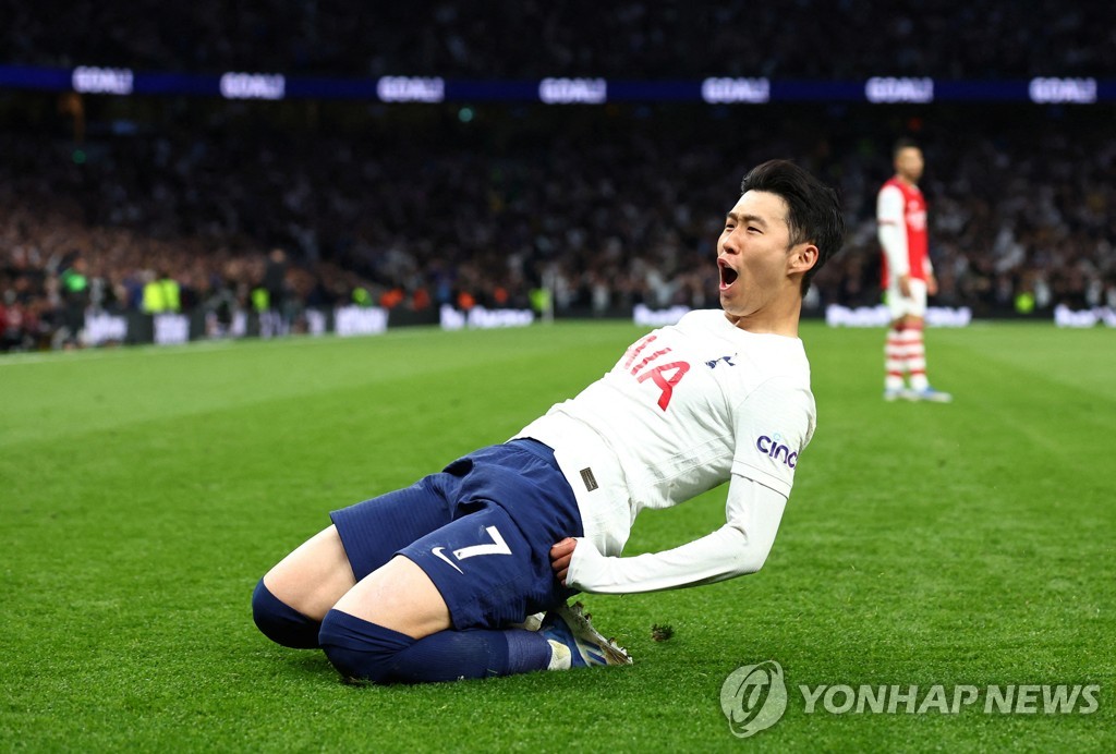 In this Reuters file photo from May 12, 2022, Son Heung-min of Tottenham Hotspur celebrates after scoring a goal against Arsenal during the clubs' Premier League match at Tottenham Hotspur Stadium in London. (Yonhap)