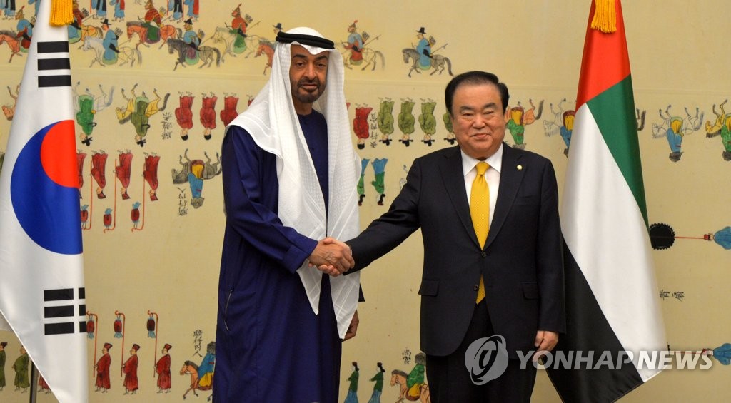 National Assembly Speaker Moon Hee-sang (R) shakes hands with UAE Crown Prince of Abu Dhabi Mohammed bin Zayed Al-Nahyan at the National Assembly in Seoul on Feb. 26, 2019, in this photo provided by the Joint Press Corps. (Yonhap)