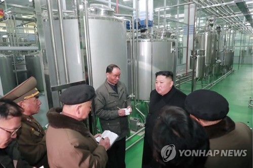 N.K. leader inspects drink factory