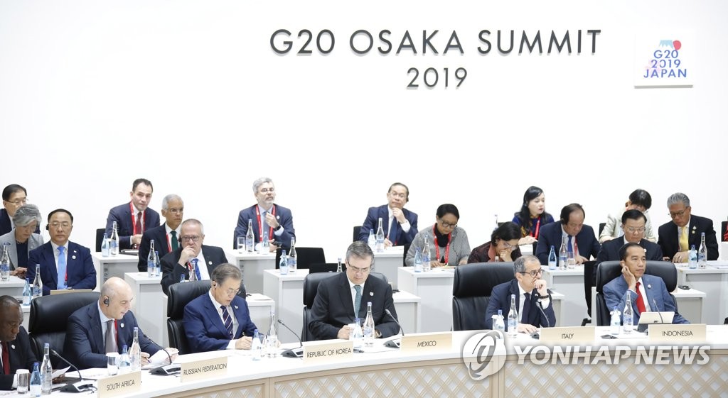 كوريا الجنوبية تركز على ضمان تسهيلات لرجال الأعمال الكوريين في مؤتمر فيديو لمجموعة العشرين - 1