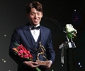 In this file photo from Dec. 2, 2019, Kim Bo-kyung, then of Ulsan Hyundai FC, holds the trophy for the K League 1 MVP award during the K League Awards ceremony in Seoul. (Yonhap)