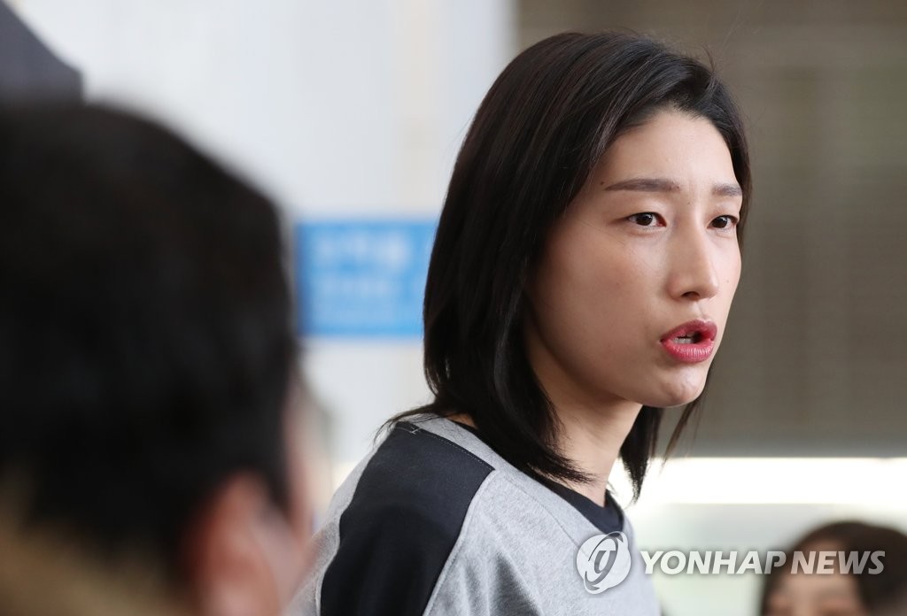 In this file photo from Feb. 20, 2020, South Korean volleyball player Kim Yeon-koung speaks to reporters at Incheon International Airport, west of Seoul, before departing for Turkey. (Yonhap)