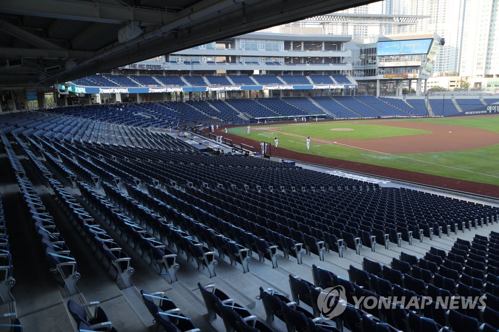 A Korea Baseball Organization regular season game between the home team NC Dinos and the Kiwoom Heroes is played in front of empty stands at Changwon NC Park in Changwon, 400 kilometers southeast of Seoul, on Aug. 19, 2020. (Yonhap)