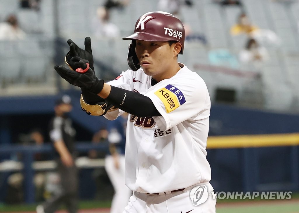 In this file photo from May 23, 2021, Song Woo-hyun of the Kiwoom Heroes celebrates a hit against the NC Dinos in the bottom of the fourth inning of a Korea Baseball Organization regular season game at Gocheok Sky Dome in Seoul. (Yonhap)