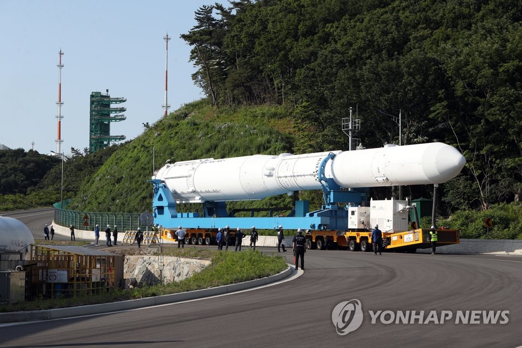 An assembled qualification model of South Korea's homegrown space rocket Nuri is transported to the launch pad at the Naro Space Center in Goheung, 473 kilometers south of Seoul, on June 1, 2021. South Korea has earmarked 2 trillion won (US$1.8 billion) to develop its first homegrown space launch vehicle, named Nuri, and aims for a launch in October this year. (Yonhap)