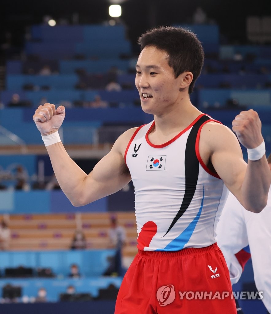 South Korean gymnast Shin Jea-hwan celebrates after completing a vault during the men's vault final at the Tokyo Olympics at Ariake Gymnastics Centre in Tokyo on Aug. 2, 2021. (Yonhap)