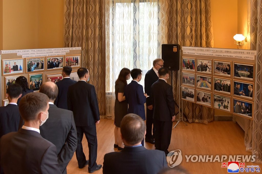 (LEAD) N.K. officials attend Russian Embassy's exhibition, resume in-person diplomacy