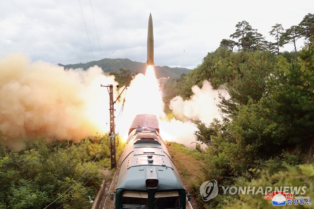 In this photo, released by North Korea's official Korean Central News Agency on Sept. 16, 2021, the North's "railway-borne missile regiment" appears to launch a short-range ballistic missile from a train during a firing drill in a central mountainous area of the North a day earlier. North Korea fired two ballistic missiles into waters off its east coast on Sept. 15, according to South Korean military authorities. (For Use Only in the Republic of Korea. No Redistribution) (Yonhap)