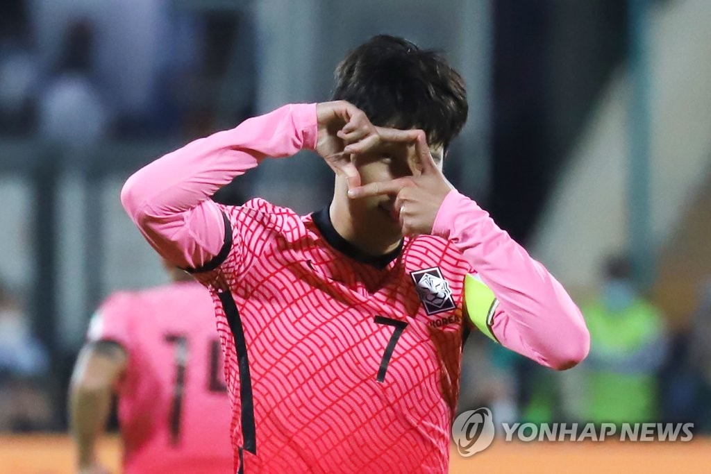 Son Heung-min of South Korea celebrates his goal against Iran during the teams' Group A match in the final Asian qualifying round for the 2022 FIFA World Cup at Azadi Stadium in Tehran on Oct. 12, 2021. (Yonhap)