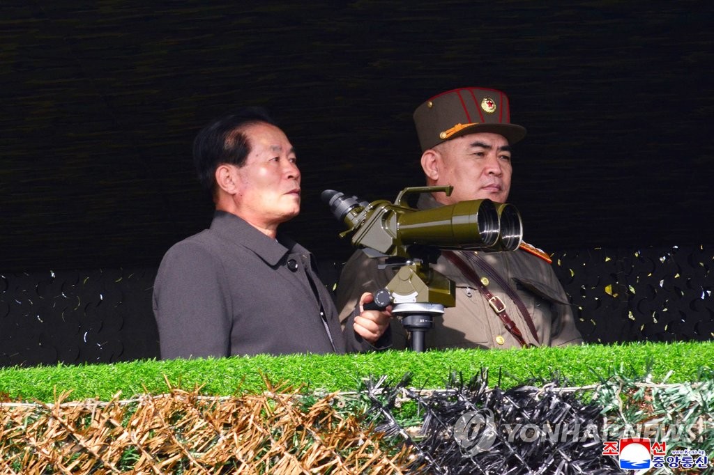 Pak Jong-chon (L), a member of the Presidium of the Politburo of North Korea's ruling Workers' Party, presides over an artillery fire competition on Nov. 6, 2021, in this photo released by the North's official Korean Central News Agency the next day. (For Use Only in the Republic of Korea. No Redistribution) (Yonhap)