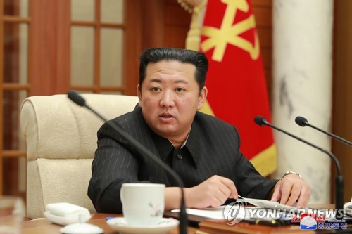 North Korean leader Kim Jong-un presides over a politburo meeting of the Workers' Party at the headquarters of the party's Central Committee in Pyongyang on Jan. 19, 2022, in this photo released by the North's official Korean Central News Agency. Kim ordered officials to reconsider all trust-building measures with the United States, instructing them to mull resuming all activities temporarily suspended. North Korea has maintained a self-imposed moratorium on nuclear and ICBM testing since late 2017. (For Use Only in the Republic of Korea. No Redistribution) (Yonhap)