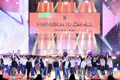 In this undated photo provided by Big Hit Entertainment on March 14, 2022, K-pop supergroup BTS performs at the "BTS Permission to Dance on Stage - SEOUL" online and offline concert at Jamsil Olympic Stadium in Seoul. BTS held three concerts on March 10, 12 and 13, respectively. (PHOTO NOT FOR SALE) (Yonhap)