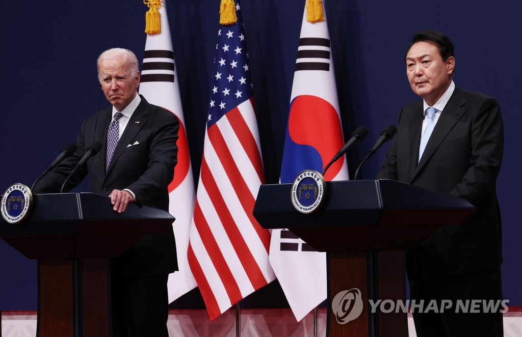 President Yoon Suk-yeol (R) speaks during a joint news conference with U.S. President Joe Biden after their talks at the presidential office in Seoul on May 21, 2022. (Yonhap)