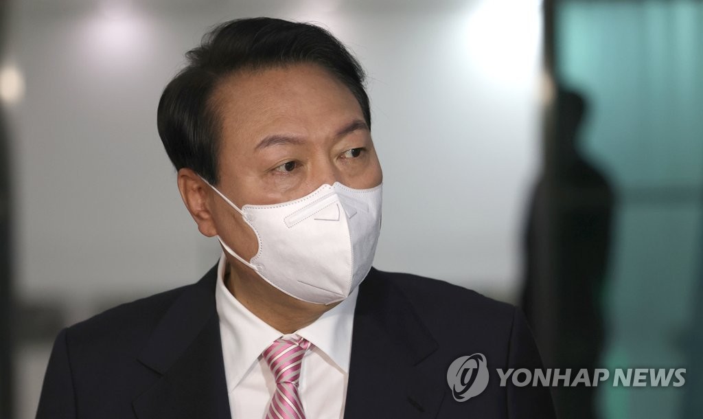 President Yoon Suk-yeol arrives at the presidential office in Seoul on May 23, 2022. (Yonhap)