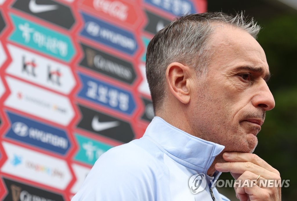 Paulo Bento, head coach of the South Korean men's national football team, speaks to reporters at the National Football Center in Paju, Gyeonggi Province, on May 30, 2022. (Yonhap)