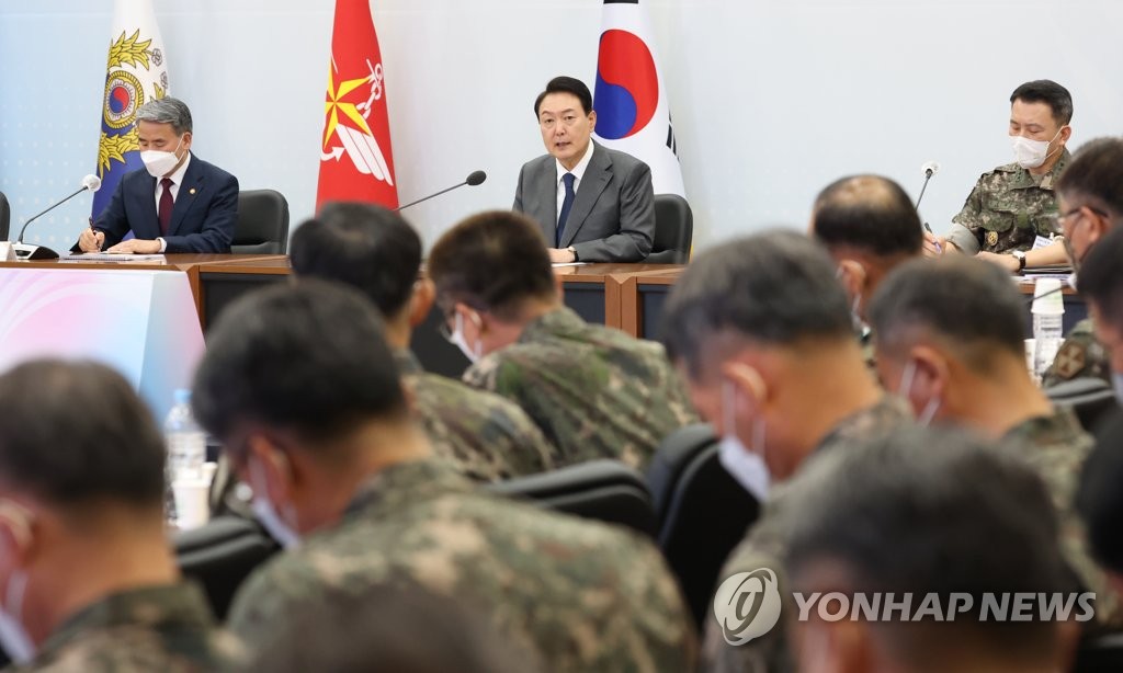President Yoon Suk-yeol presides over a meeting of top military commanders at the Gyeryongdae military headquarters, 160 kilometers south of Seoul, on July 6, 2022. (Yonhap)