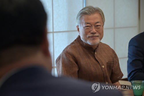 Ex-President Moon calls for peace amid heightened tension over N.K. missile launch