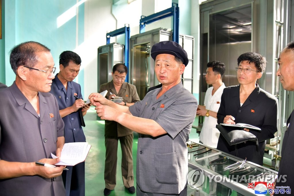 N.K. premier inspects construction equipment factory