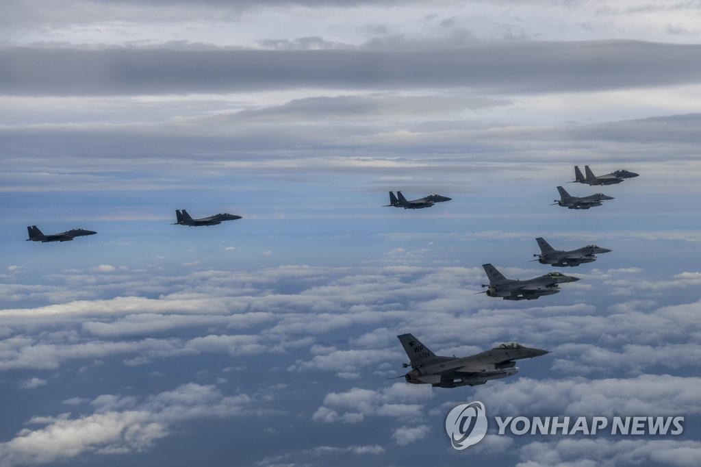 South Korean and U.S. fighters engage in air drills on Oct. 4, 2022, in this photo provided by Seoul's Joint Chiefs of Staff. (PHOTO NOT FOR SALE) (Yonhap)